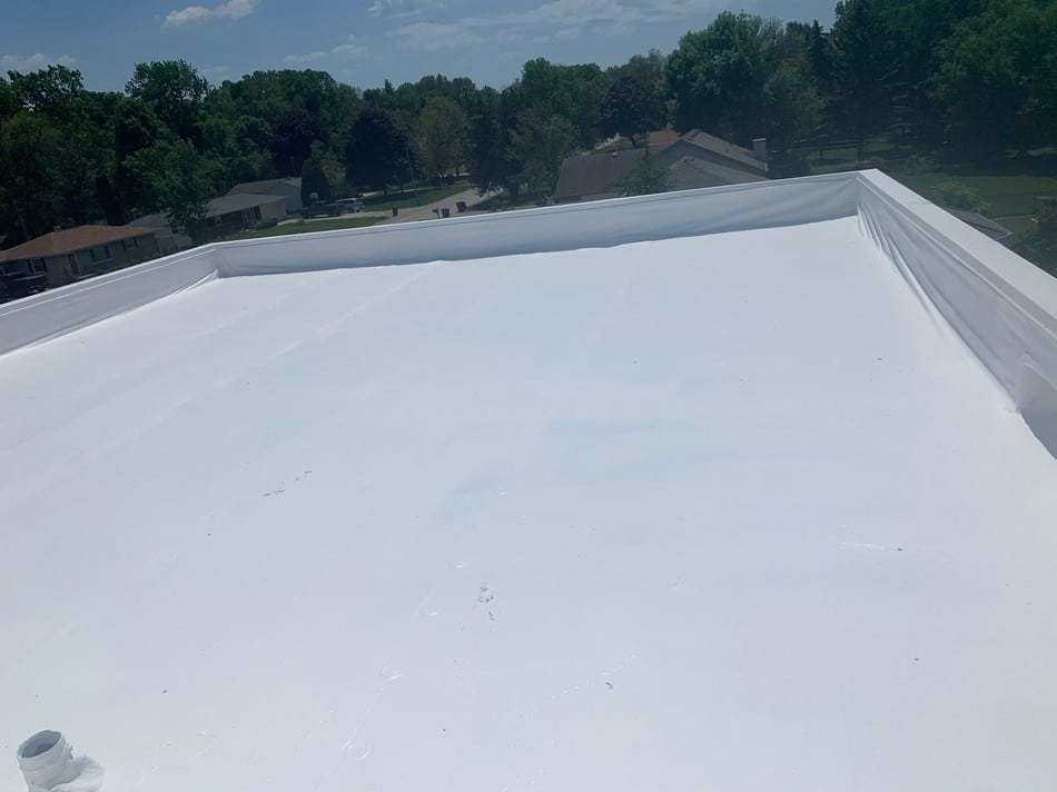 Professional membrane restoration project by Roof Tech LLC showcasing superior coating application and weather protection